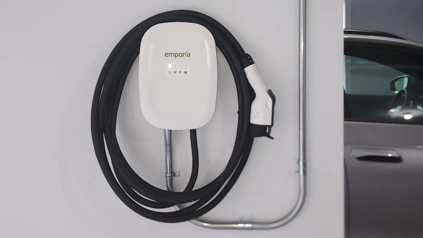 Emporia EV charger mounted in a garage